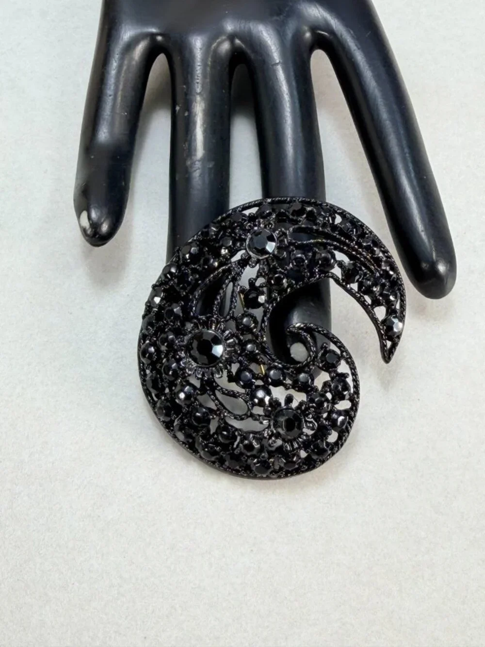Vintage M.JENT Black Rhinestone Swirl Brooch Gold Tone Openwork Statement Pin